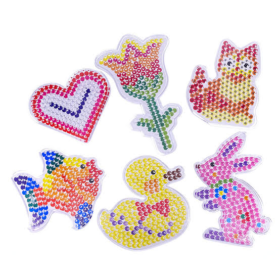 Large perler bead animal and flower designs made by young children