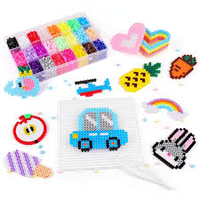 Bead storage box with finished perler bead cars hearts and rainbows