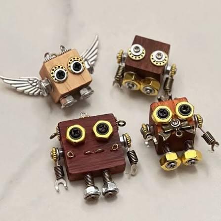 Punk style robot figures built from metal parts and found objects by children